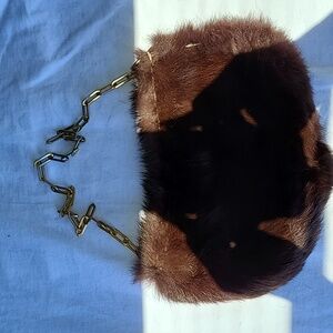 The Limited Brown Fur Purse is so cute for the winter time, wear it with a fur!